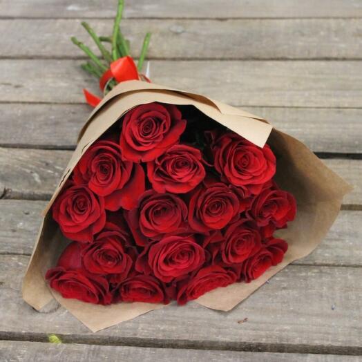 Red roses in craft paper