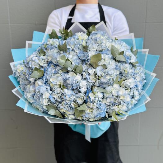A large bouquet of blue hydrangeas