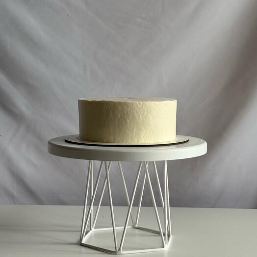 Pastel con una decoración simple en un paquete Premium