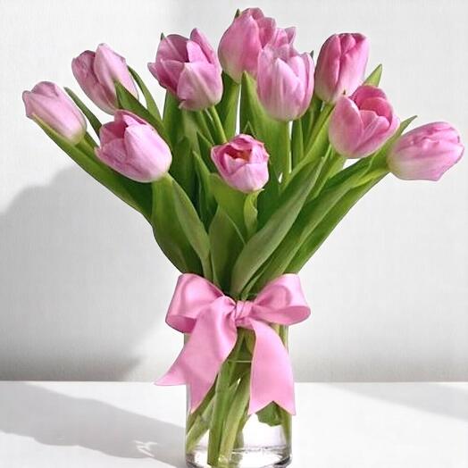 Pink tulip with glass vase