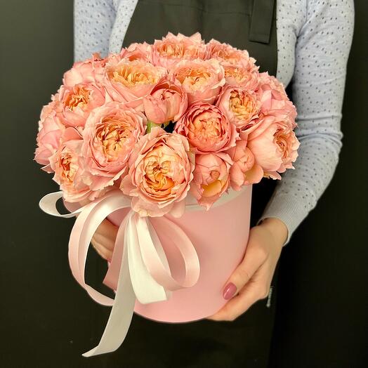 Rosas en forma de peonía en una Caja