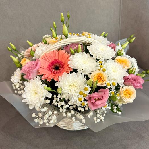 Basket with gerbera and bush rose