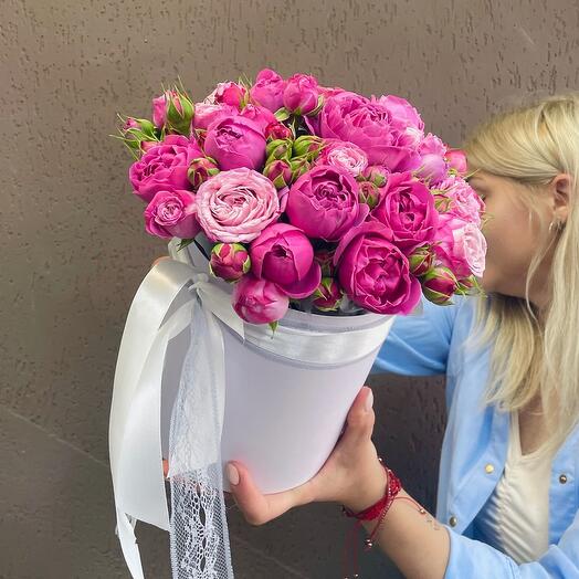 Rosas en forma de peonía en una Caja