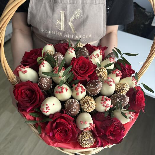 Basket with chocolate-covered strawberries and roses