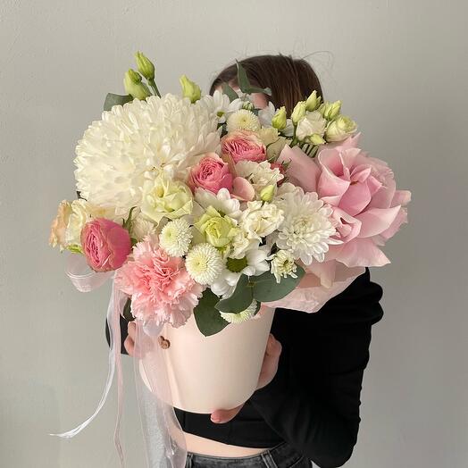 Flowers in a box with a single-headed chrysanthemum