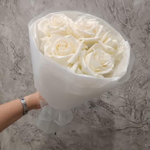 Delicate bouquet with white roses