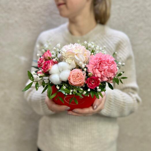Arrangement of fresh flowers in a box
