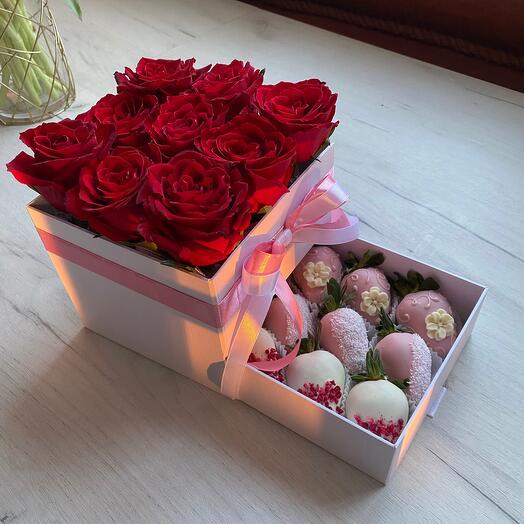 Composición de rosas y fresas cubiertas de chocolate