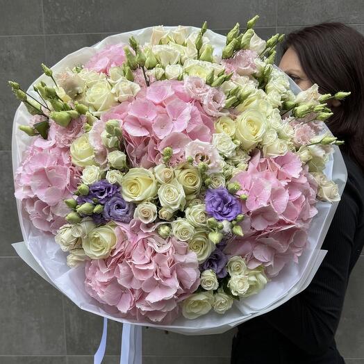 Bouquet of pink hydrangeas, white spray roses and eustoma
