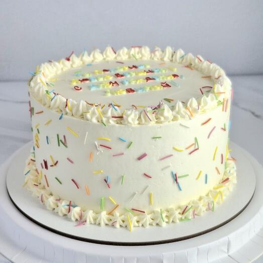 Cake with rainbow sprinkles and ruffles