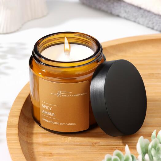 Vela perfumada en tarro "ST Spicy Amber", 90 G