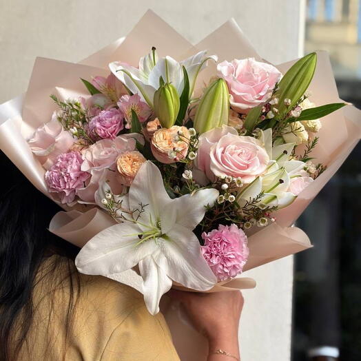 Bouquet of lilies spray roses carnations