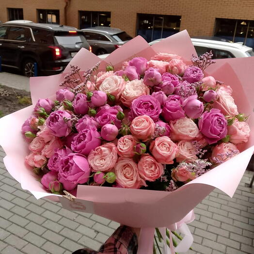 Bouquet of Ecuadorian bushy peony-shaped rose in designer packaging