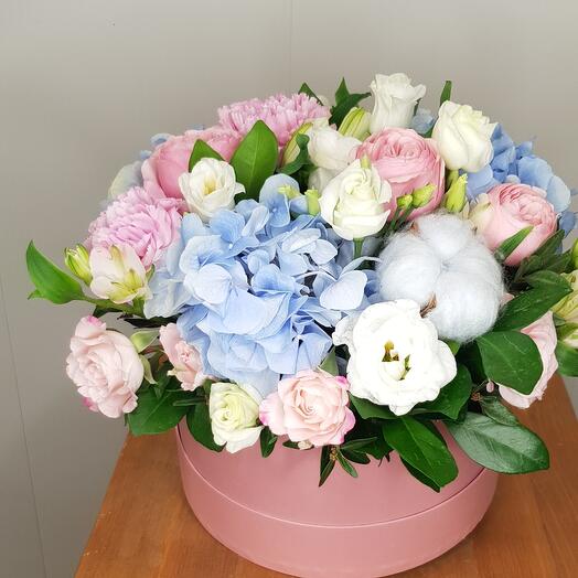 Flowers in a box. Blue hydrangea and peony rose