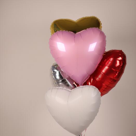 A bundle of 5 foil hearts