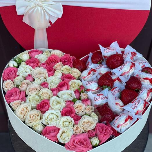 A box with flowers and berries