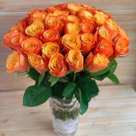 30 orange rose in crystal vase