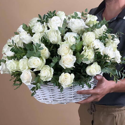 white roses in a basket