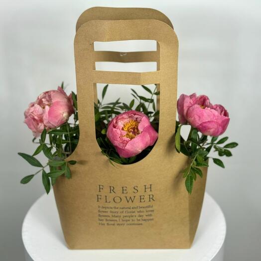 3 beautiful peonies in a handbag