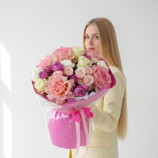 A bright bouquet with a French rose