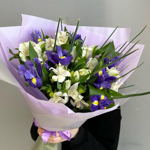 Bouquet of bright irises and persistent Alstroemeria