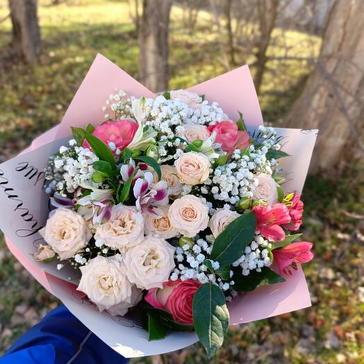 A bouquet of bush roses and gypsophila