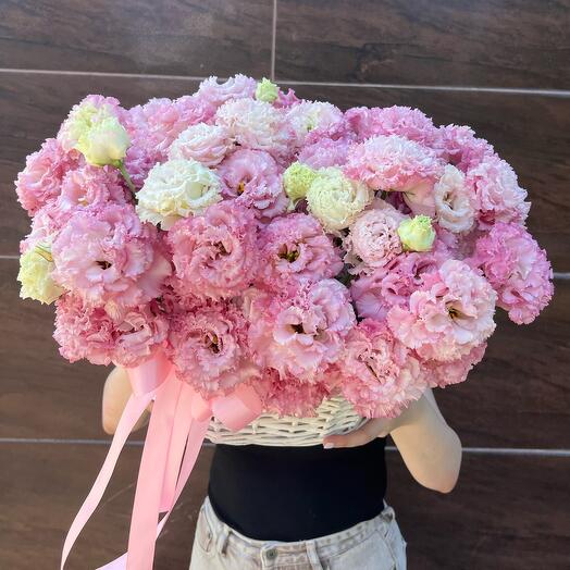 A composition of 23 eustoma branches in a basket