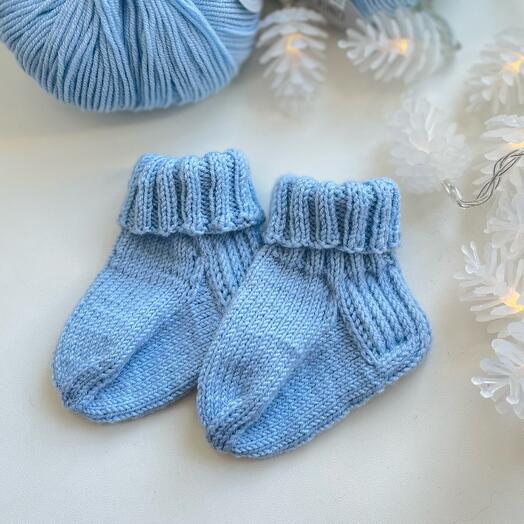 Socks for a newborn made of merino wool