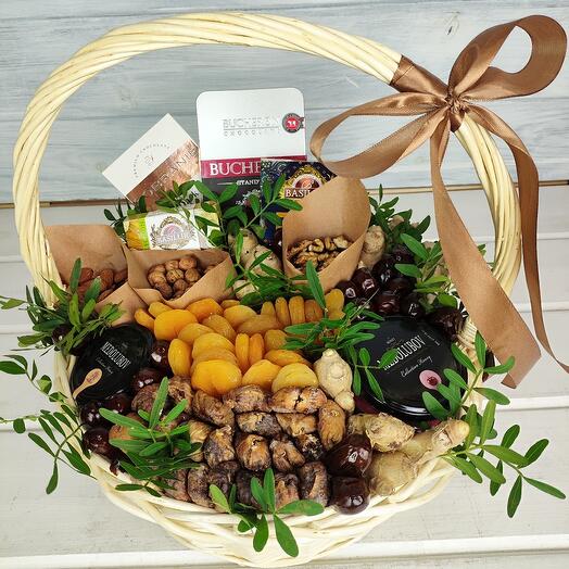 Cesta de nueces, frutas secas, miel y chocolate