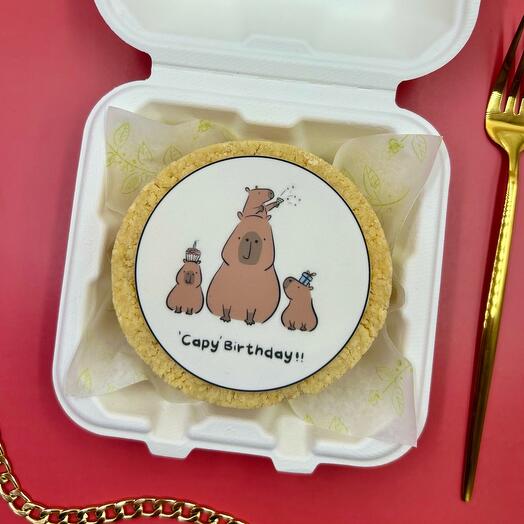 Tarta de queso con capibara como regalo de cumpleaños