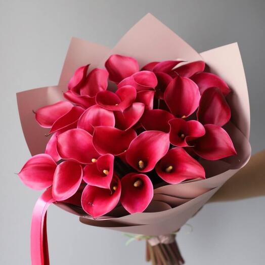 Pink calla lilies in a package
