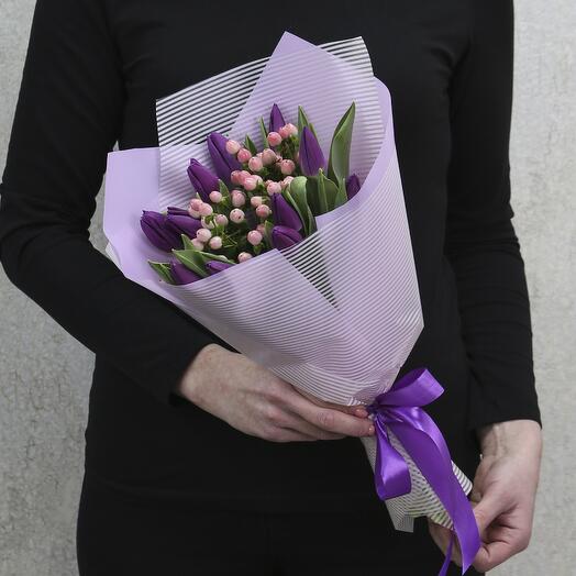 11 purple tulips and pink hypericum in a package