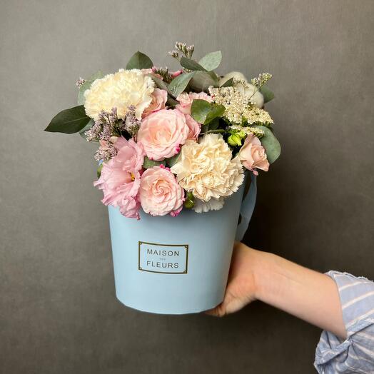 The flowers are beautiful in a blue MAXI box, with a bush rose, dianthus and eucalyptus
