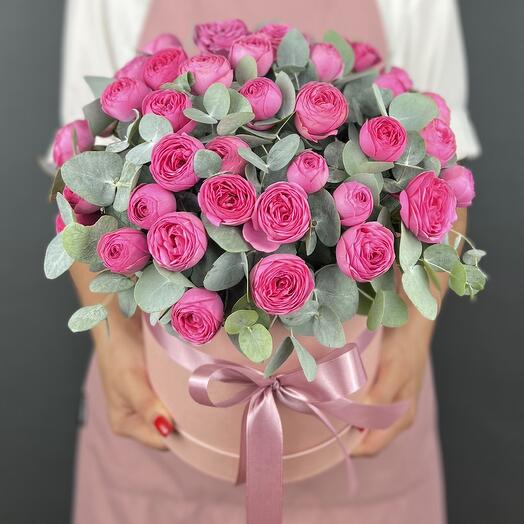 Flowers in a box. bush roses of Silva Pink and Eucalyptus (L)