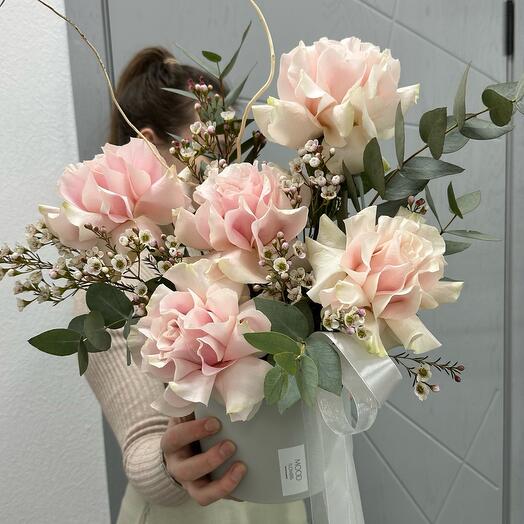 A delicate French rose in a hatbox