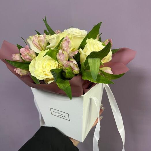 A box of Roses mixed with alstroemeria in a box