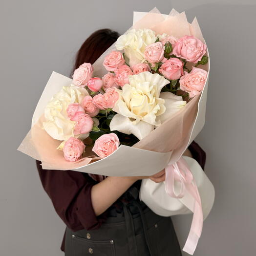 The warmth of a white lotus , bushy and delicate roses