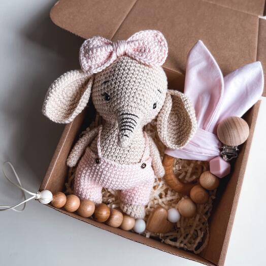 Baby boxing with an elephant