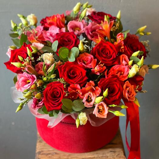 Beautiful bouquet in a box of roses, eustoma, alstroemeria
