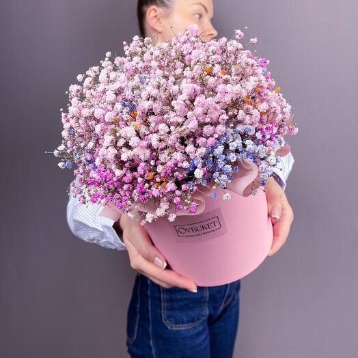 Flowers in a box with a delicate colorful gypsophila