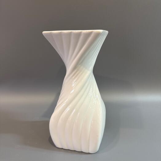 The vase is "twisted"