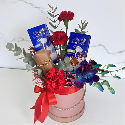 🌹 Royal Bond Gift Hamper | Red Carnations   Blue Orchid with Premium Chocolates – Elegant Floral Surprise