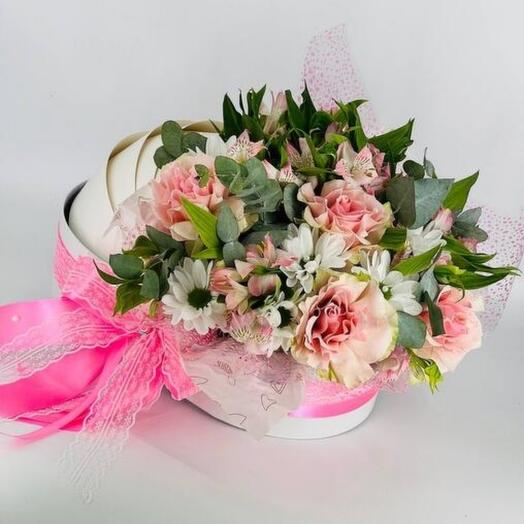 A bouquet of flowers in a wheelchair for the discharge of a girl from the hospital