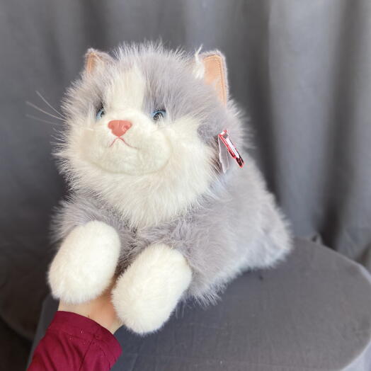 Поющий плюшевый серый котик