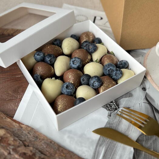 Chocolate covered strawberries with blueberries