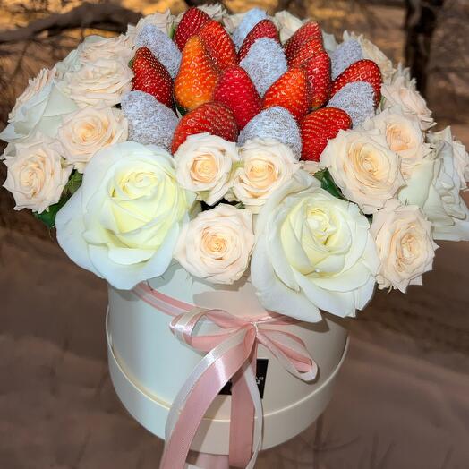 Flowers in a box with strawberries