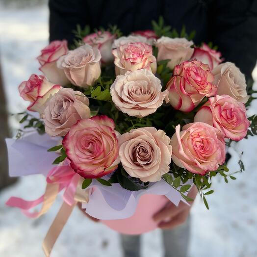 Flowers in a box of rose powder