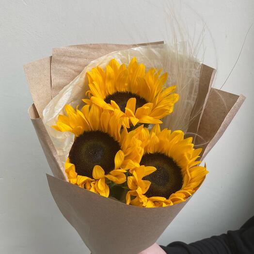 Bouquet of sunflowers in craft