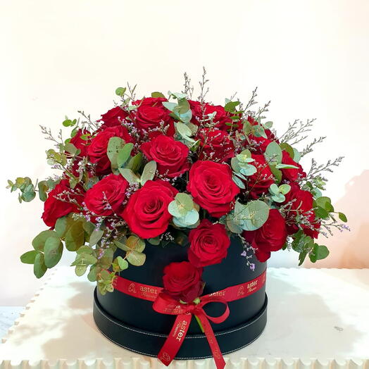 Gorgeous Red Mix: Fresh Red Roses, Eucalyptus Leaves, and Limonium in a Box