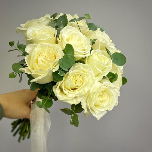 Bridal bouquet with white roses and eucalyptus